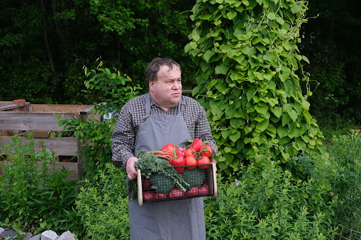 Autistic man in a vegetable garden