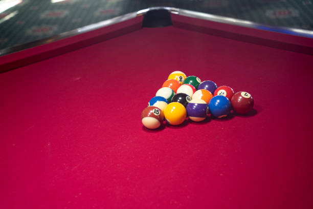 istock Playing billiards at a billiard bar 1487396456