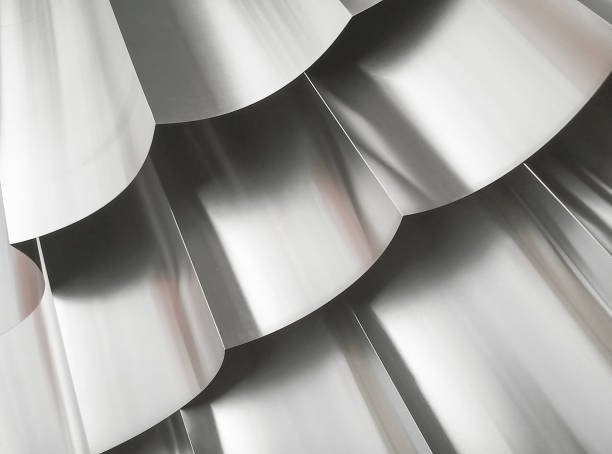 stack of curved rectangular aluminum curved rectangular piece of aluminum. industrial aluminum metal pile. small square pieces arranged neatly metalwork stock pictures, royalty-free photos & images