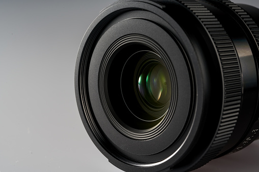 A close-up detail of a mirrorless camera lens