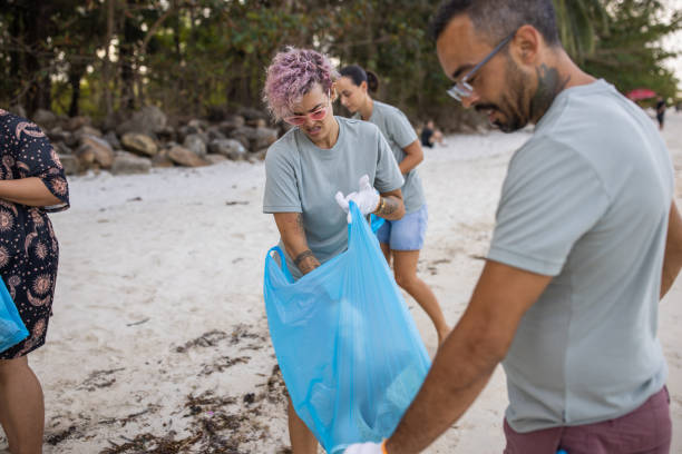 istock Activists cleaning the beach 1487405470