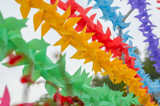 istock Colorful plastic toy small windmill close-up 1487406553