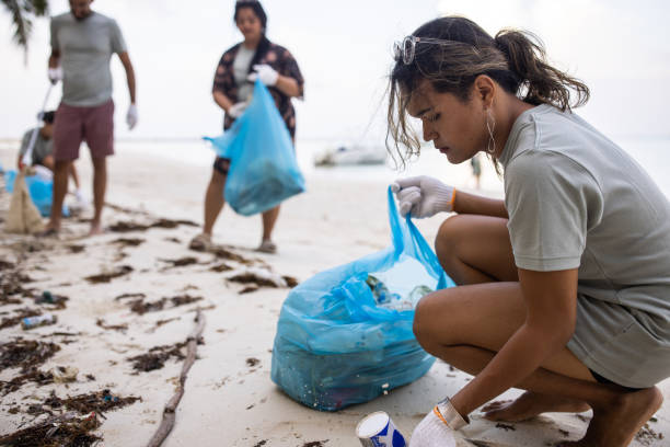 istock Environmental activists cleaning nature 1487406601