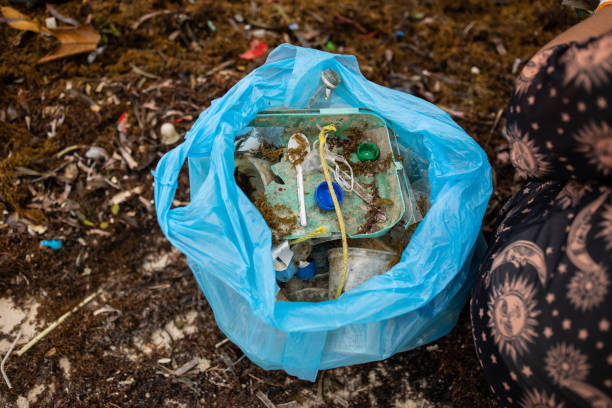 Garbage and plastic waste from the sea in a plastic bag.