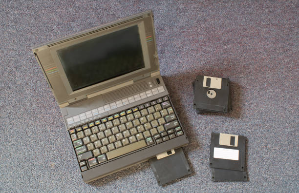 istock floppy disks and old laptop on a bedroom carpet 1487416012
