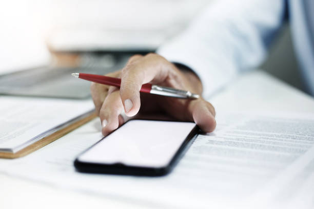 istock business person working on desk 1487417148