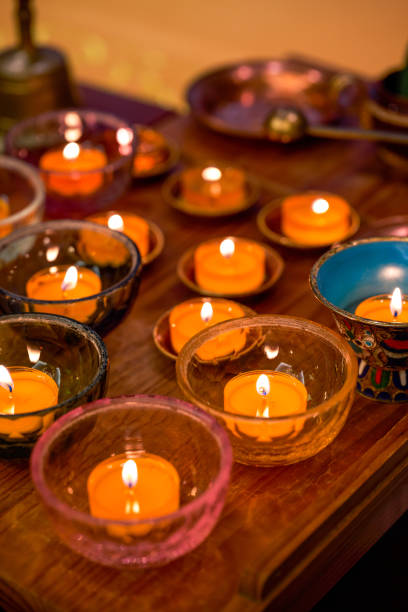 istock The tray is filled with lighted golden candles 1487417463