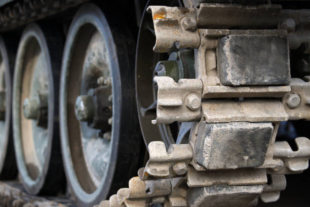 istock Military tank continuous track rear view 1487418166