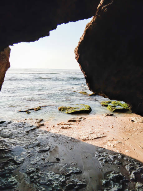 istock A cave with sea view in Suluban or Blue Point Beach, Bali. 1487419374