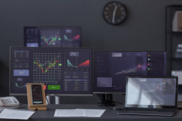 istock Workplace of brokers with monitors 1487420322