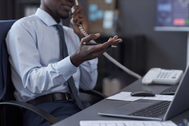 istock Broker talking on the phone with customer 1487420381