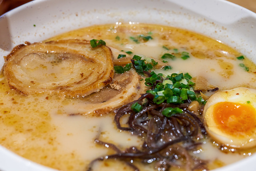 Close-up of a bowl of delicious pork bone soup char siu ramen
