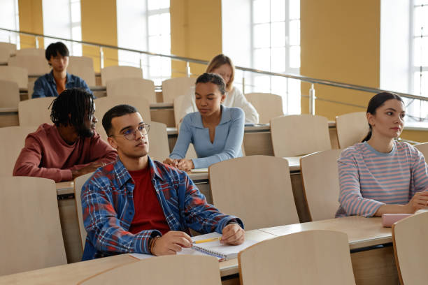 istock Group of college students sitting at lecture 1487422506