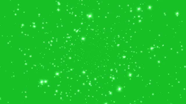 Magical particles streaming on green screen background motion graphic effects.