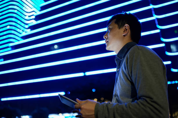 istock Asian businessmen with tablets thinking 1487427221