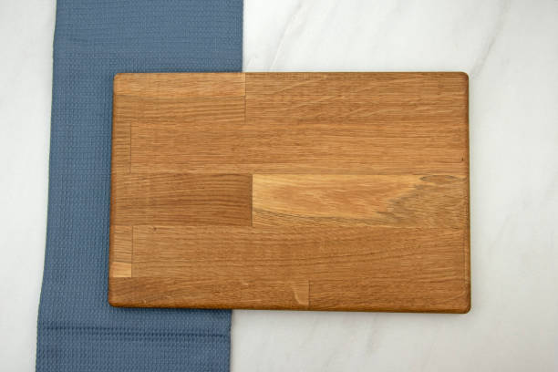 istock Wooden chopping board with copy space 1487427354