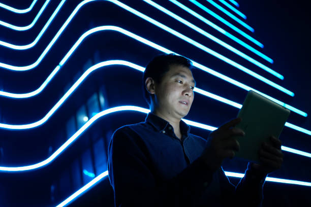 istock Asian businessmen conscientiously use tablet computers outside 1487427394