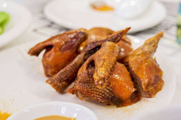 Dum sum including Shrimp Dumpling, Chicken Feet in Soy Sauce, Brown Sugar Cake, Barbecued Pork Bun in the restaurant in Guangzhou, Guangdong.