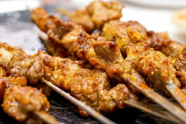 Close-up of tempting Xinjiang barbecue lamb skewers