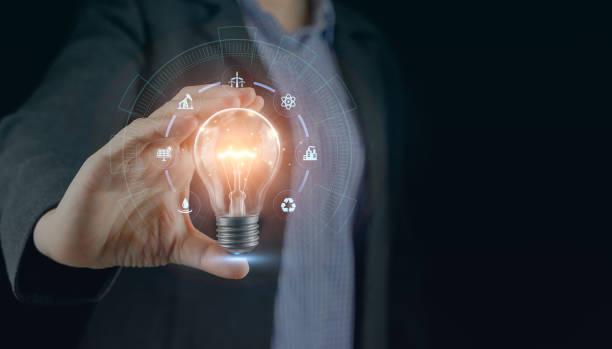 istock Power concept Ecology Elements energy sources. Hand hold light blub. Innovation and invention glow environment thinking sustainability, reusable, renewable power for bright future responsibility. 1487429812