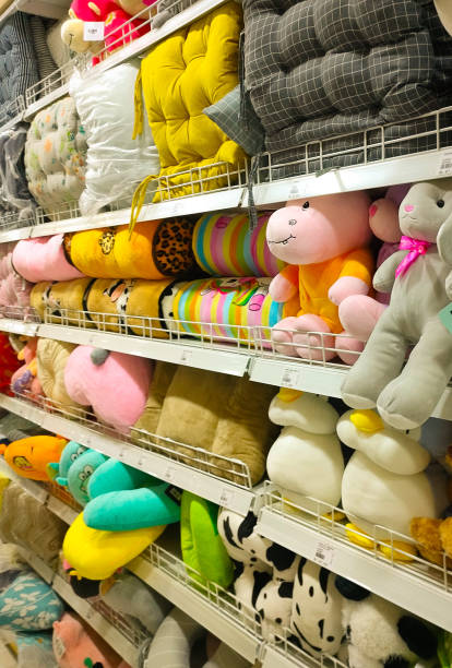 istock Colorful Dolls Neatly Arranged on a Shelf 1487429939