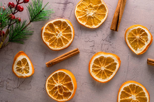 istock Dried orange slices on vintage background 1487432250
