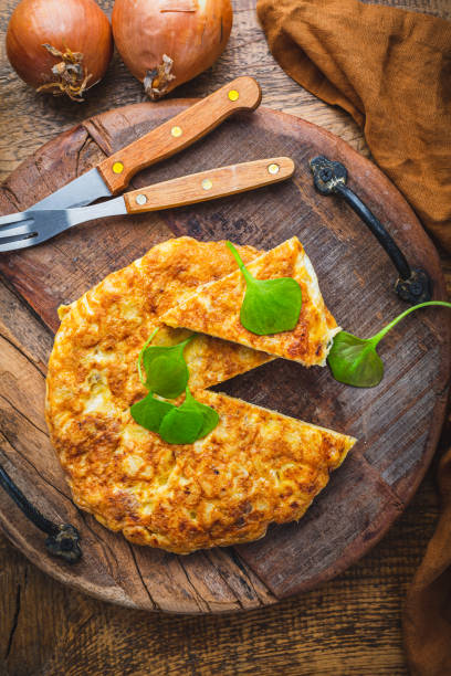 istock Spanish omelet (Tortilla de patatas) with potatoes and onion 1487434246