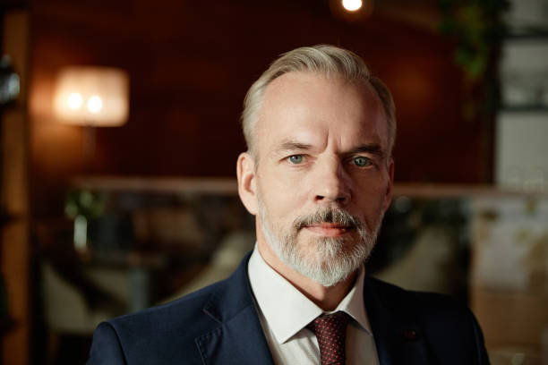 istock Mature bearded businessman in suit 1487434335