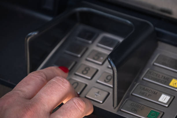 istock woman hand using atm keys. turkey, turkish. 1487438745