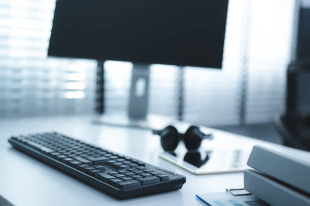 istock work desk with laptop and documents, books, modern interior of cozy cabinet, table for businessman or student at home, comfortable workspace, workplace with computer in apartment Keywords: 1487440661