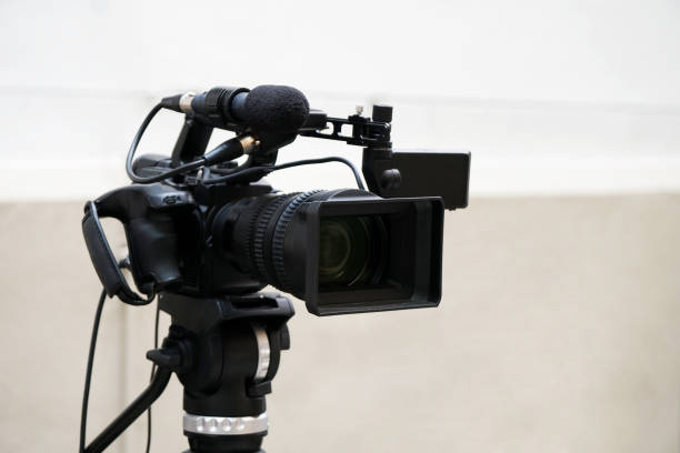 istock digital video or movie camera on tripod 1487444424