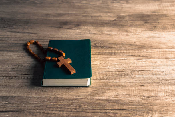 istock Cross and bible on the table 1487444667