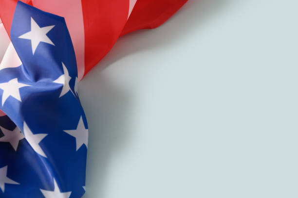 istock American flag on blue background. Copy space. 1487446799