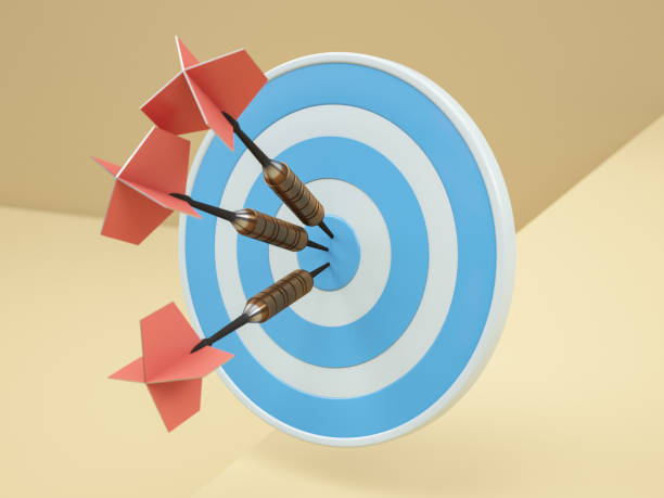 three dart arrows hit the bulls eye - target aspirations bulls eye dart imagens e fotografias de stock