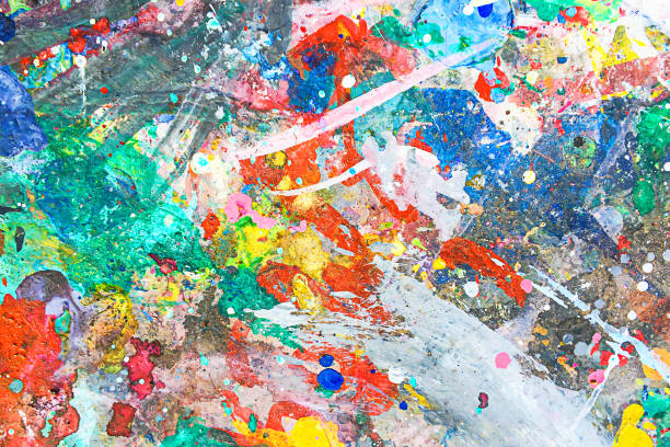 istock Abstract background painted with acrylic paints in different colors. 1487449509