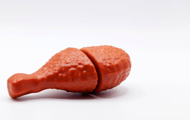 istock plastic toy chicken stick on white background 1487454444