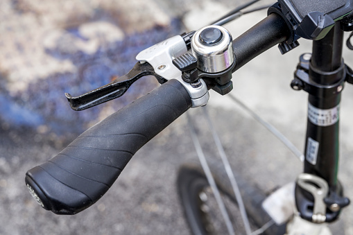 Close-up of the handlebar of the bicycle front