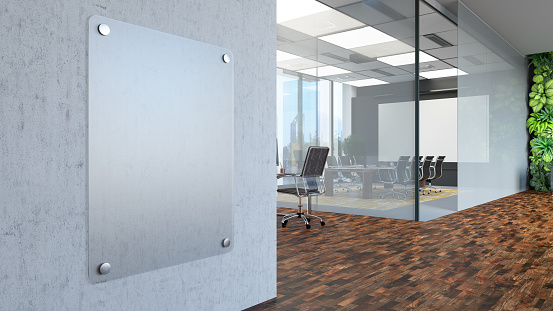 Interior Of An Empty Modern Open Plan Office With Empty Sign On The Wall. 3D Render