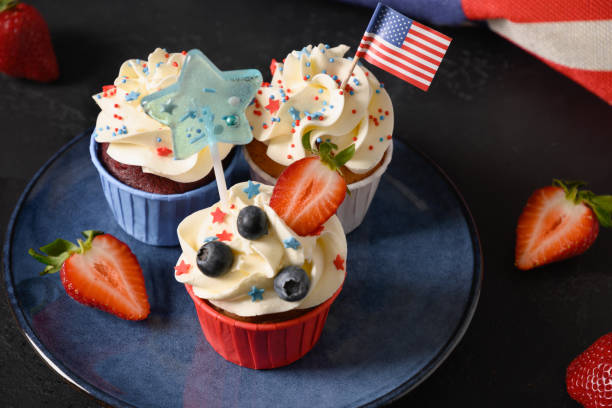 istock Patriotic American cupcake with decorations and USA flag. 1487461955