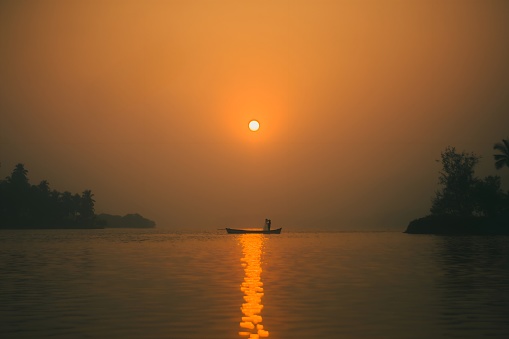 Had to wait long time for this perfect timing picture of fishermen doing his daily work at sunrise