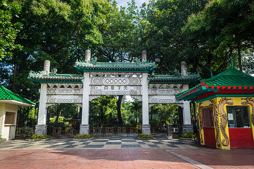 Rizal Park, Manila, Philippines July 2, 2014: The beautiful arch at the entrance to the Chinese Garden at the Rizal Park in Manila, Philippines
