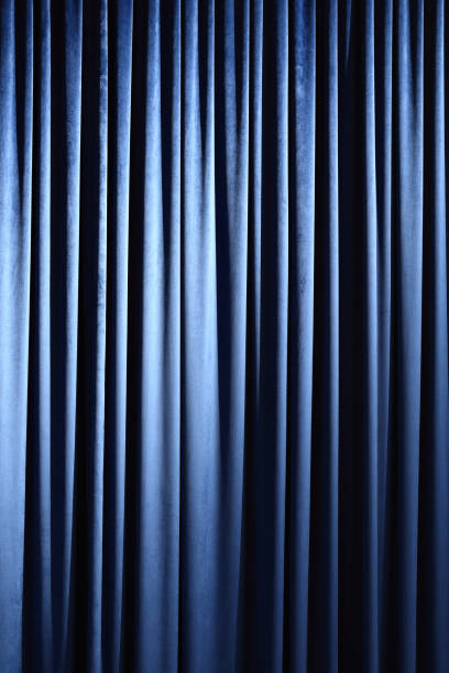 istock Blue Stage curtain wallpaper background 1487467952