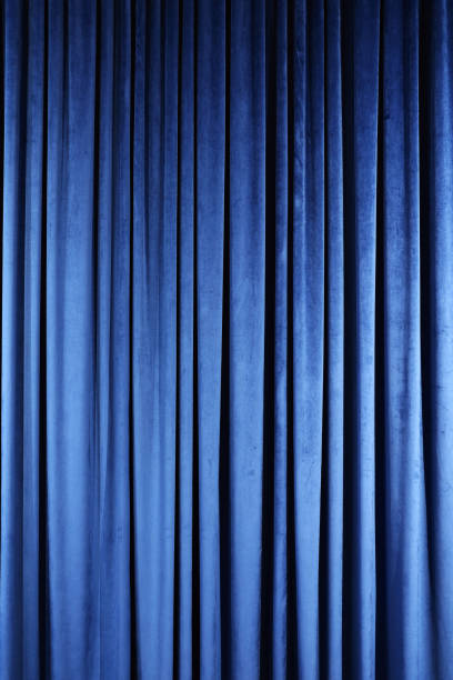 istock Blue Stage curtain wallpaper background 1487467973