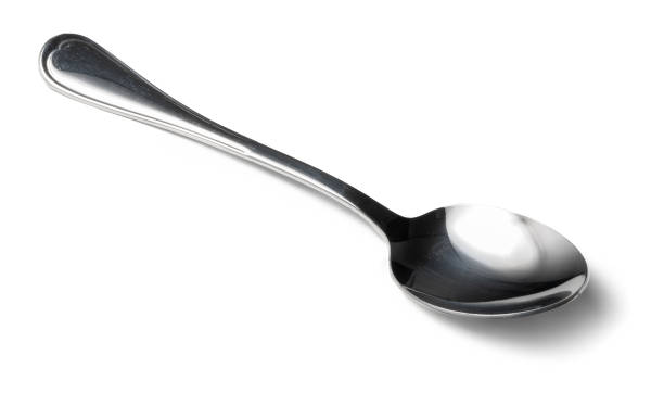 istock Stainless cutlery spoon isolated on white background 1487468141