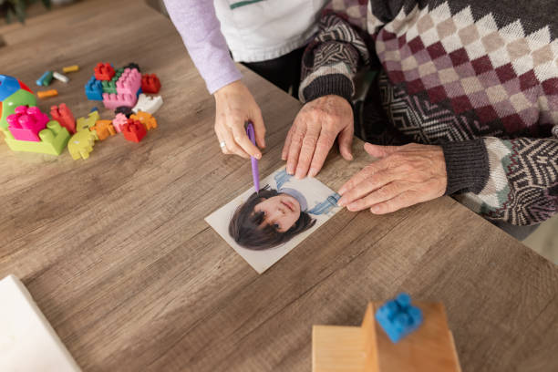 istock Photo therapy for elderly man with Alzheimer’s Disease 1487468377