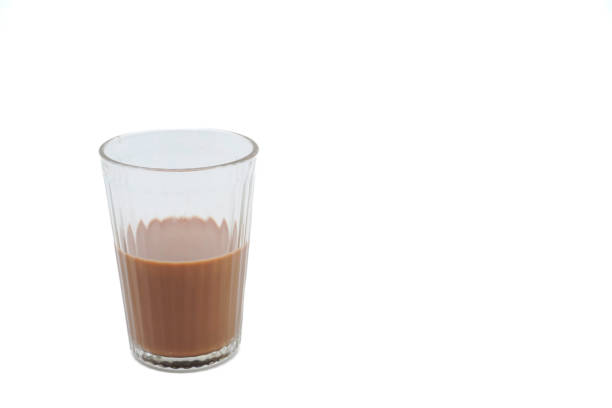 istock A half full cup of creamy coffee, isolated on white background with copy space. 1487468860