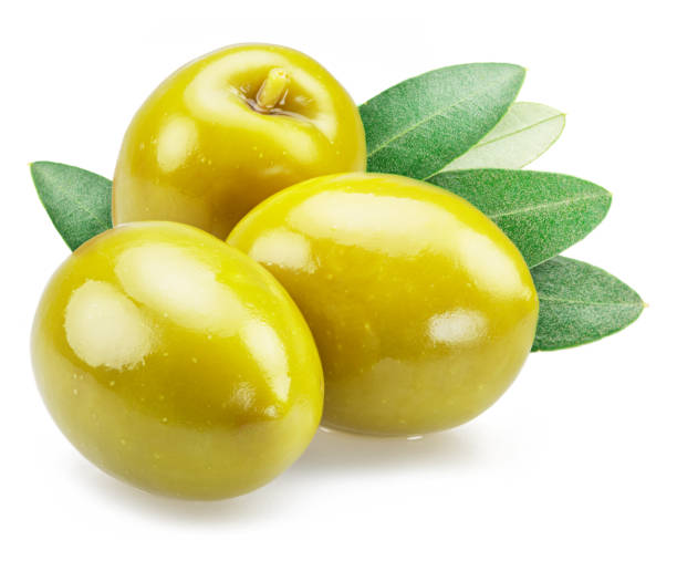 istock Three whole green olives with olive leaves isolated on white background. 1487469885