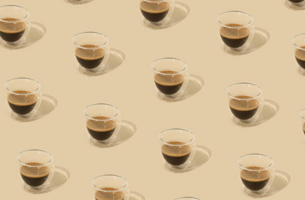 istock Creative trendy pattern made of coffee on pastel background. Minimal concept. 1487472254