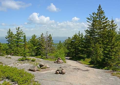 Acadia National Park, Maine, United States. Bates cairn made of pink granite marks trail along Cadillac Mountain