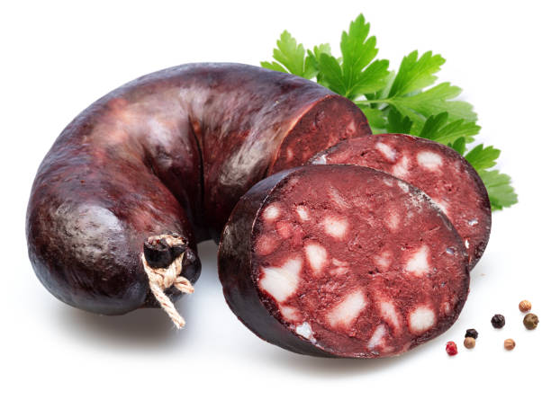 Blood sausage with suet pieces and parsley leaf isolated on white background. Blood sausage with suet pieces and parsley leaf isolated on white background. buristo stock pictures, royalty-free photos & images